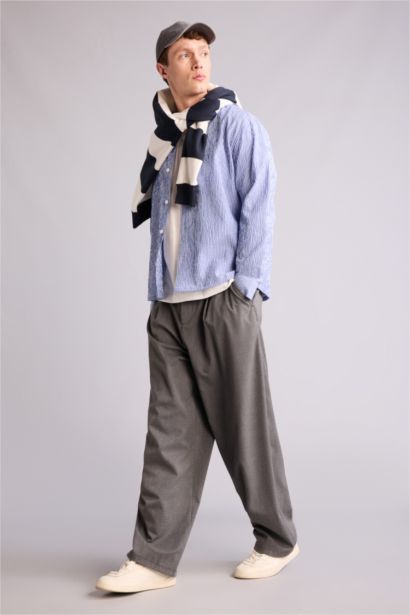 بنطلون برجل عادية