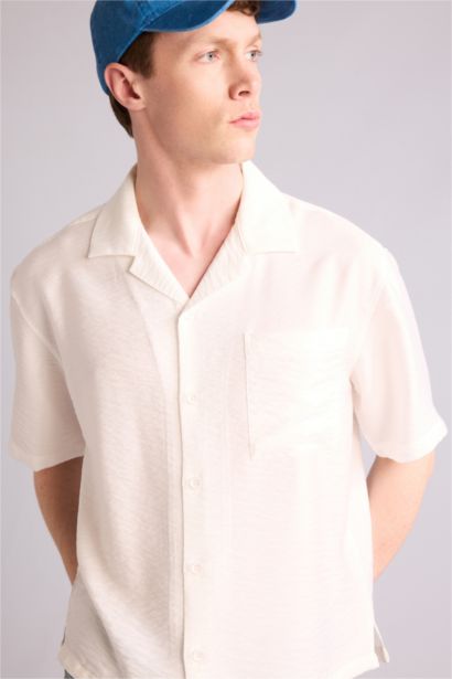 قميص نص ردن بوكسي فيت قماش كرنكيل