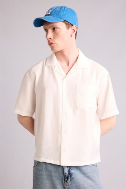 قميص نص ردن بوكسي فيت قماش كرنكيل