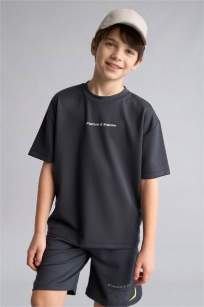 Футболка оверсайз из модала с круглым вырезом принтом-слоганом и коротким рукавом для мальчиков