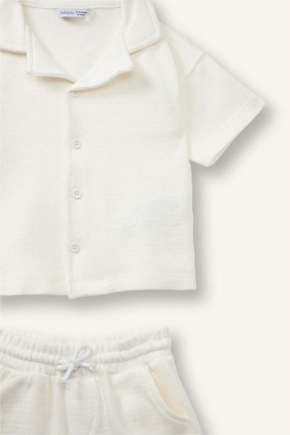 سيت جاكار بياقة بولو من قطعتين