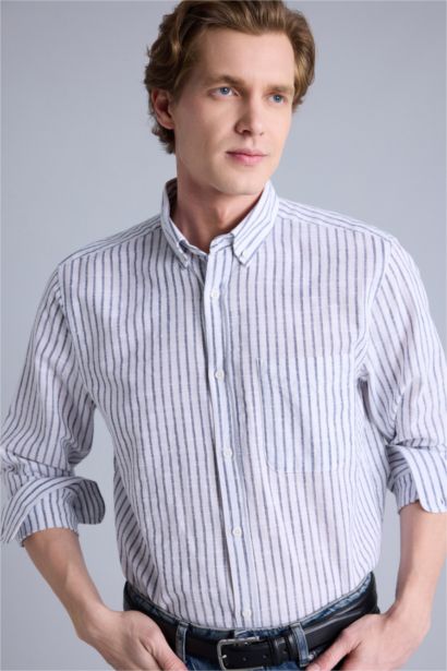 قميص بولو كم طويل قصة عادية