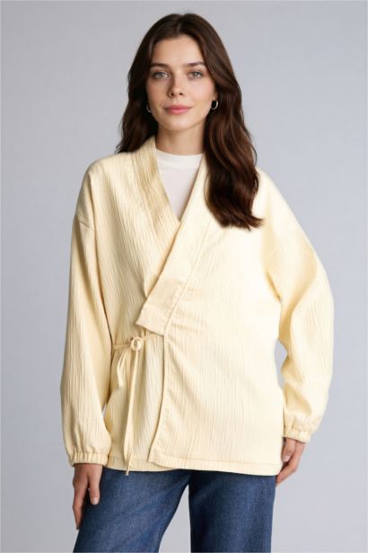 سترة بليزر قصة عادية بياقة V من قماش مجعد