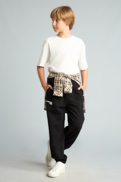 Pantalon de survêtement noir imprimé à taille élastique Coupe ballon pour garçon