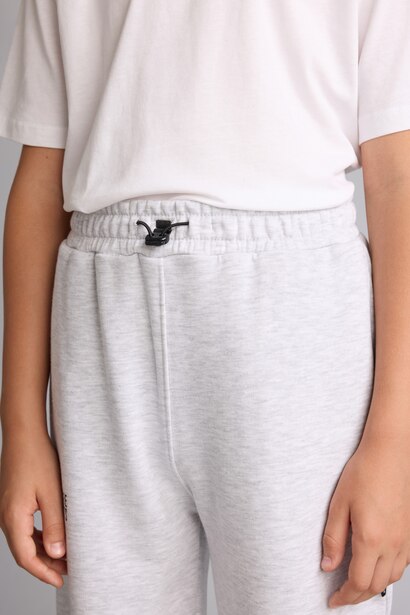 Pantalon de survêtement gris clair chiné oversize imprimé en coton pour garçon