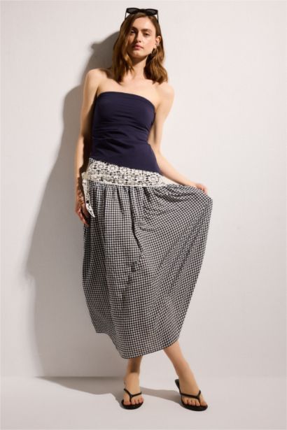 A Kesim Pötikareli Maxi Etek