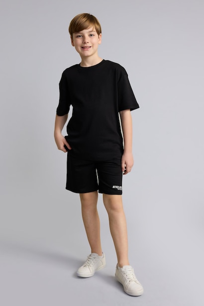 Short en molleton imprimé slogan oversize pour garçon