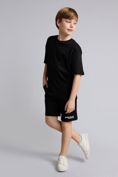 Short en molleton imprimé slogan oversize pour garçon