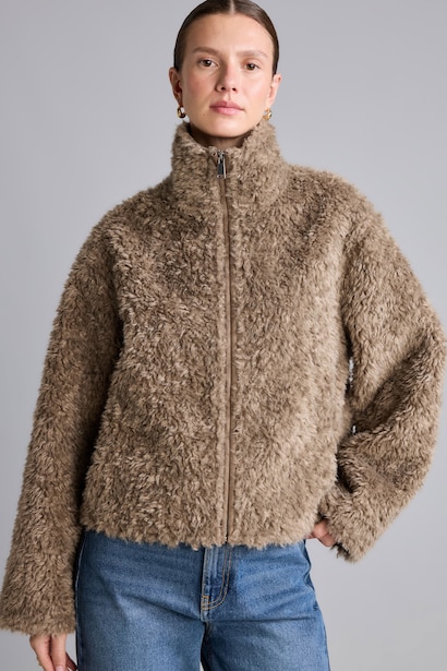 Veste en fausse fourrure à col montant et fermeture éclair Coupe régulière