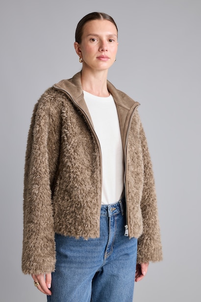 Veste en fausse fourrure à col montant et fermeture éclair Coupe régulière