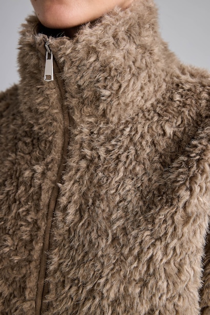 Veste en fausse fourrure à col montant et fermeture éclair Coupe régulière