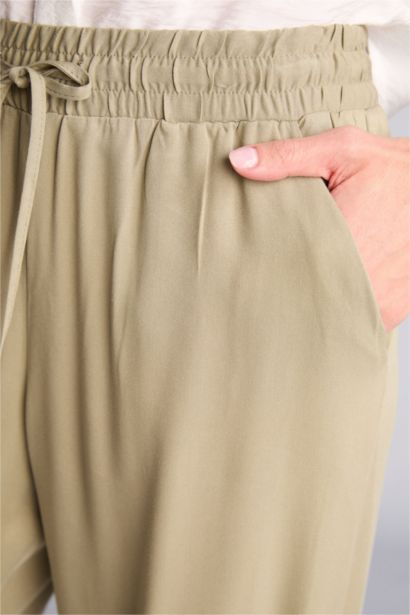 بنطرون بالمندو فلورايدا برجل واسع بجيب وخصر عالي