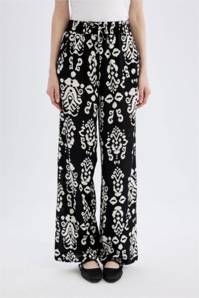 بنطرون فلورايدا وايد ليج برجل واسع بجيب وخصر عالي