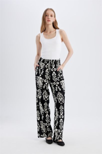 بنطرون فلورايدا وايد ليج برجل واسع بجيب وخصر عالي