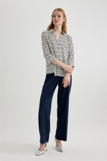 قميص ردن طويل منقوش قصة عادية