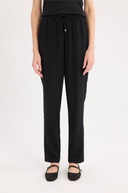 بنطرون بالمندو قصة عادية برجل عادي بجيب وخصر عادي