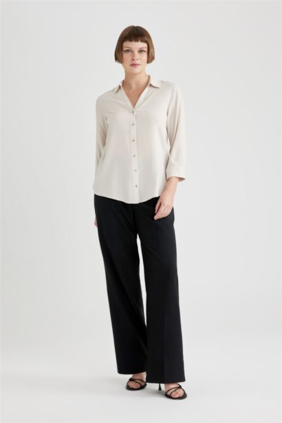 قميص كم طويل قصة عادية