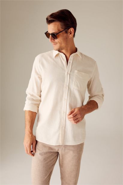 قميص بولو كم طويل قصة عادية