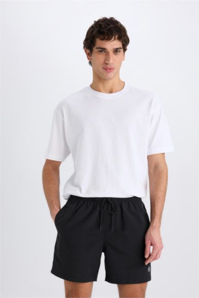 شورت بحر قصير مبطن بشبكة