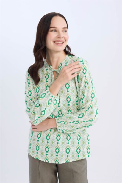 بلوزة ردن طويل قصة عادية بياخة مستديرة