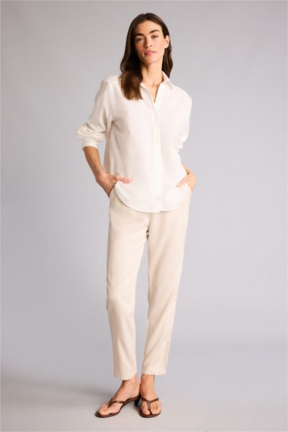 Pantalon Belmando style harem à taille haute avec poches et jambes droites