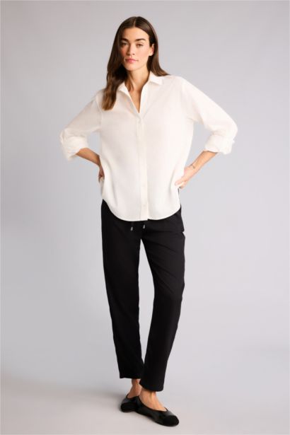Pantalon Belmando style harem à taille haute avec poches et jambes droites