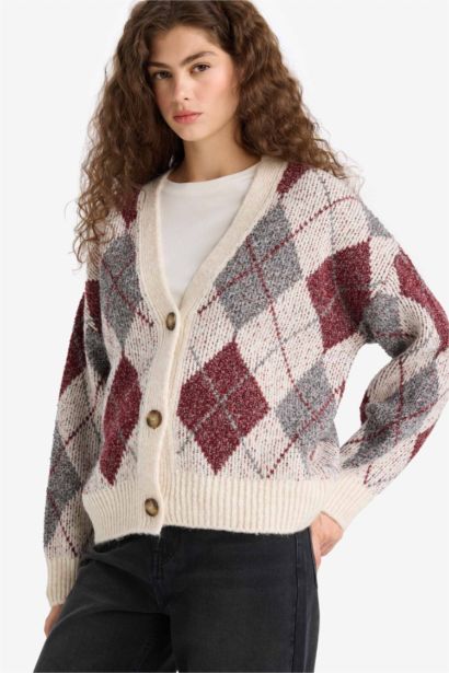 جاكيت تريكو اوفر سايز بياخة V