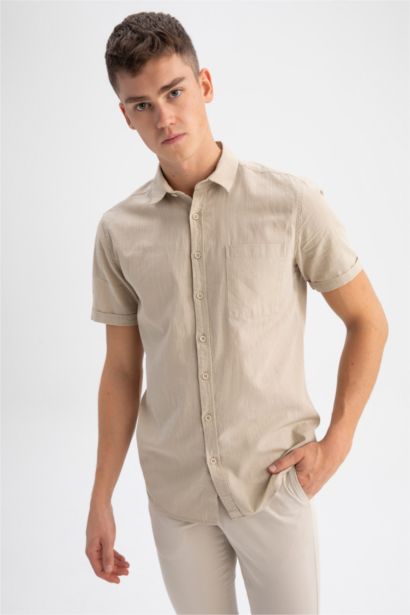 Chemise à manches courtes en 100 % coton, col polo, coupe slim