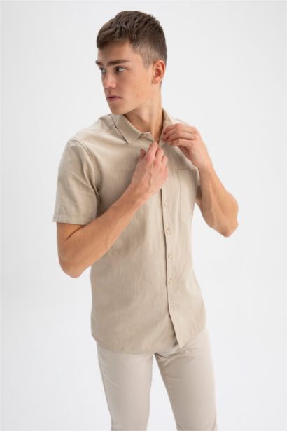 Chemise à manches courtes en 100 % coton, col polo, coupe slim