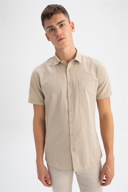 Chemise à manches courtes en 100 % coton, col polo, coupe slim