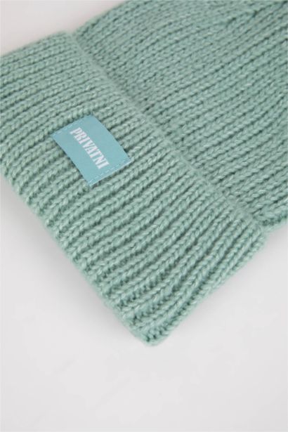 Woman Woven Labeled Winter Beanie