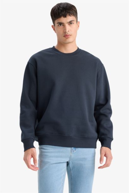 سويت شيرت قصة مريحة بياقة مستديرة