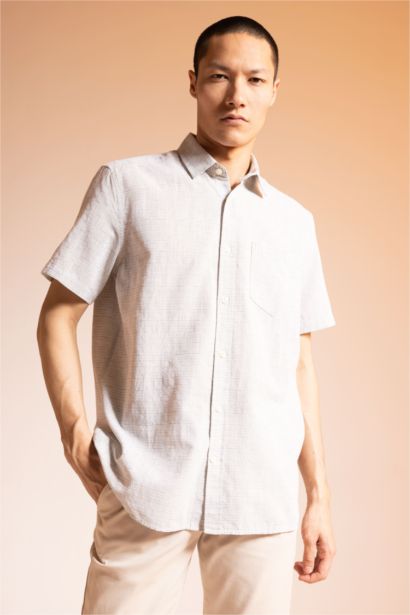 Chemise à col polo et manches courtes 100% coton