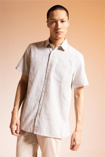 Chemise à col polo et manches courtes 100% coton