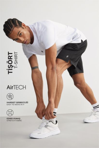 تيشيرت رياضي سليم فيت نص كم برقبة مستديرة من DeFactoFit