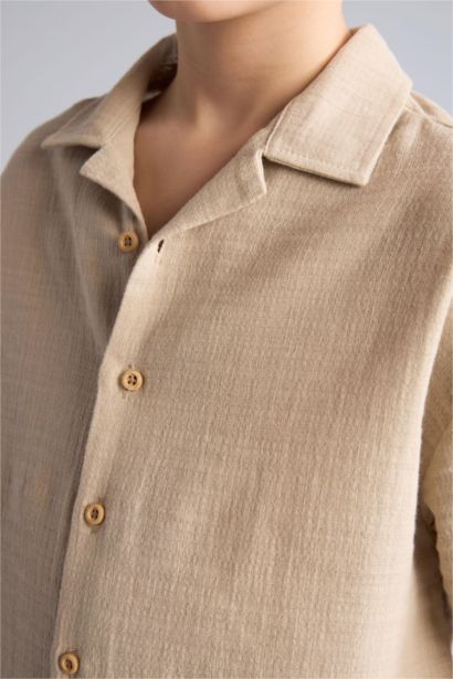 قميص نص كم موسلين اوفر سايز بياقة بولو