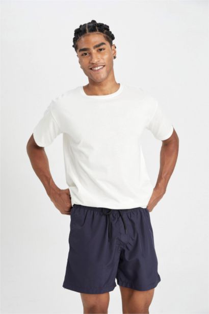 Short de bain avec doublure en filet