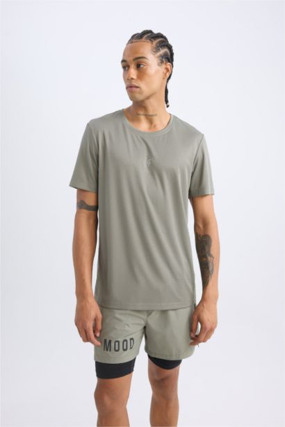 تيشيرت رياضي سليم فيت نص كم برقبة مستديرة من DeFactoFit