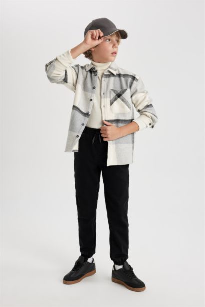 بنطلون جينز جوجر اولادي بأستك من تحت وبطانة صوفية أسود