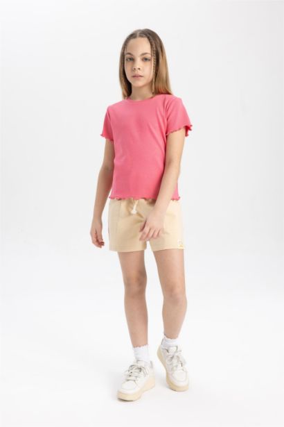 Girl with Pockets and Woven Label Shorts