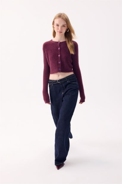 جاكيت تريكو سليم فيت بياخة مستديرة