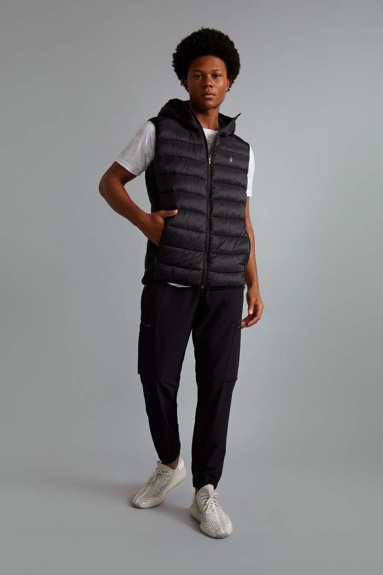 DeFactoFit Slim Fit Su İtici Kapüşonlu Yanları Squba Kumaş Şişme Yelek