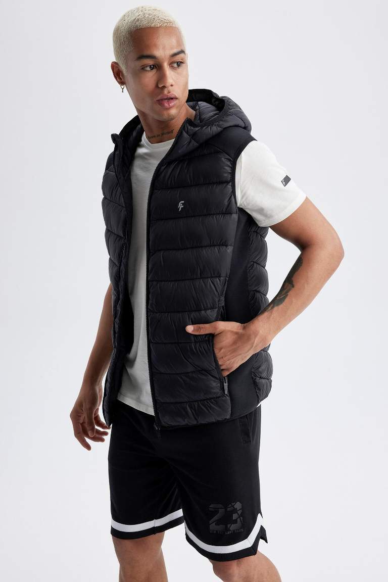 DeFactoFit Slim Fit Su İtici Kapüşonlu Yanları Squba Kumaş Şişme Yelek