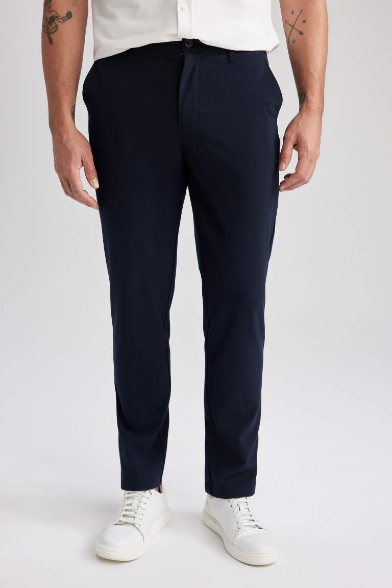 Navy MAN Tailored Regular Fit All Directional Stretch Trousers 2788884 ...