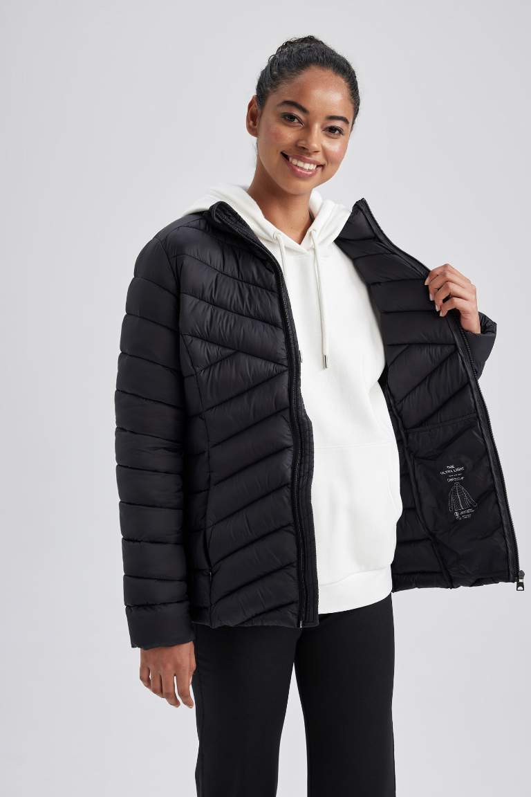 DeFactoFit Su İtici Slim Fit Ultra Hafif Kapitoneli Şişme Mont