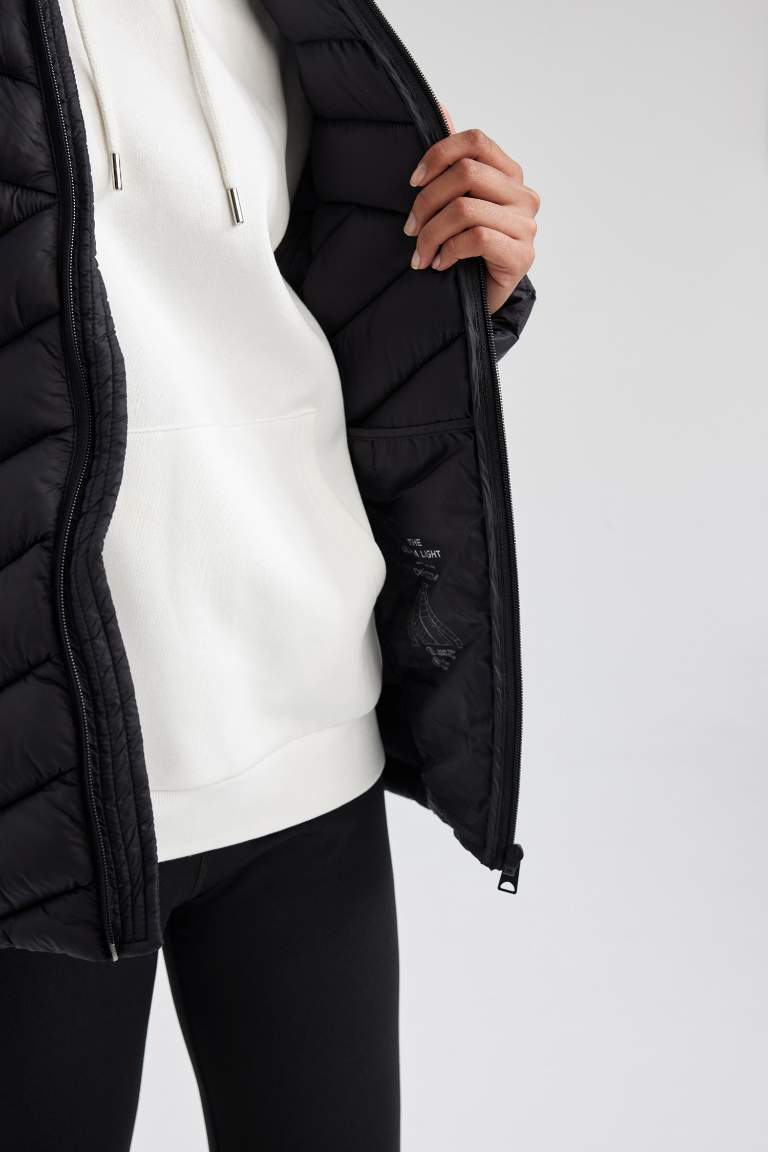 DeFactoFit Su İtici Slim Fit Ultra Hafif Kapitoneli Şişme Mont