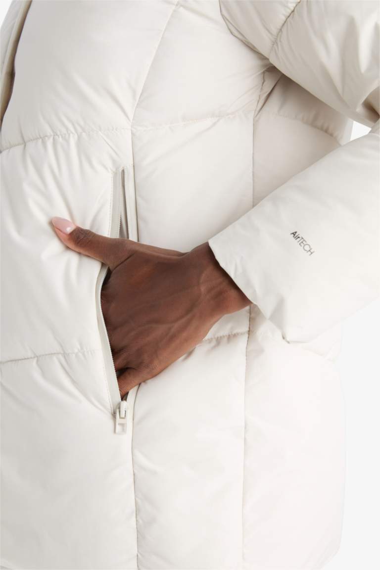 Jacket imperméable à capuche avec doublure polaire de DefactoFit