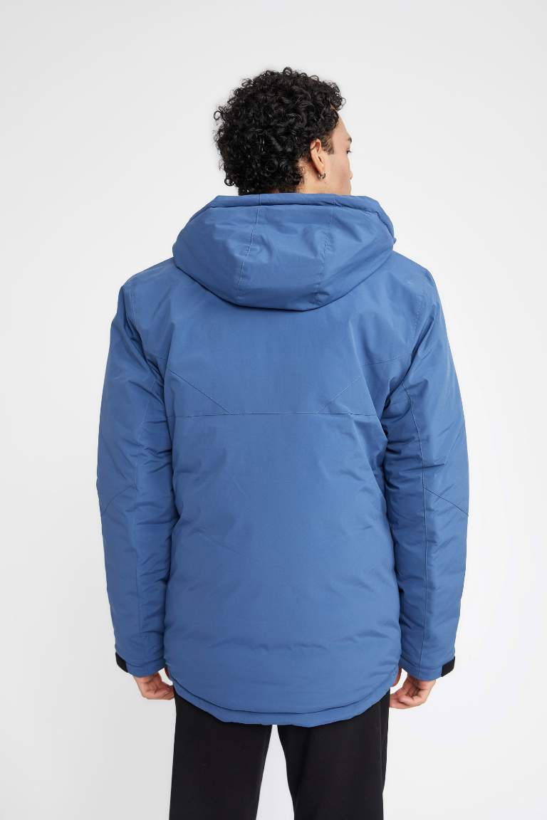 DeFactoFit Su İtici Slim Fit Dar Kesim Kapüşonlu Polar Astarlı Fermuarlı Su Geçirmez Mont