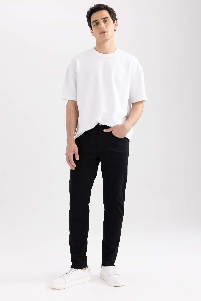 Slim Tapered Fit Dar Kalıp Normal Bel Daralan Paça Jean Pantolon