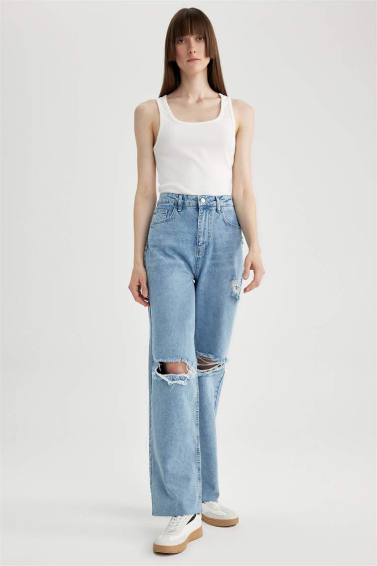 بنطلون جينز 90’S برجل واسع ممزق